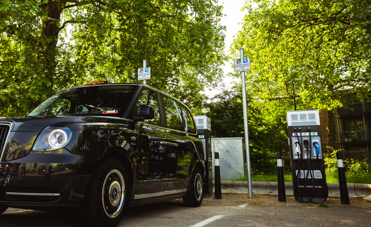 Electric taxi at charger